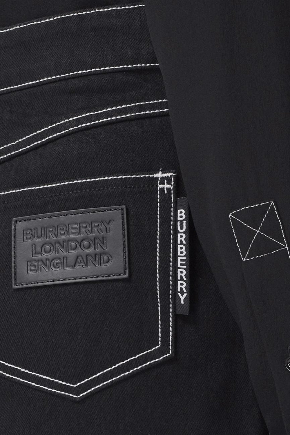 Burberry contrast-stitch raw-denim skirt