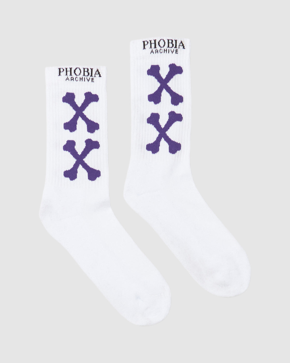 PHOBIA WHITE SOCKS WITH PURPLE CROSSED BONES